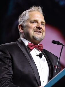 Portrait of Vit Jedlicka, Founder at Liberland, delivering a keynote at Dutch Blockchain Week 2026 in Amsterdam.